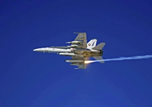 An F/A-18C Hornet testing its flare countermeasures system prior to heading into Iraq An F/A-18C Hornet testing its flare countermeasures system prior to heading into Iraq