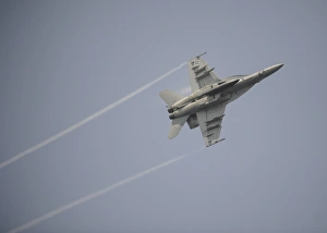An F/A-18E Super Hornet in flight over the Gulf of Oman An F/A-18E Super Hornet in flight over the Gulf of Oman