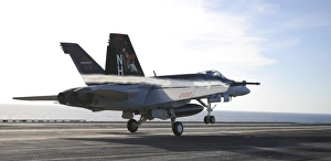 An F/A-18E Super Hornet touches the flight deck of USS Nimitz An F/A-18E Super Hornet touches the flight deck of USS Nimitz