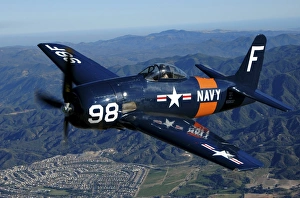 An F8F Bearcat flying over Chino, California An F8F Bearcat flying over Chino, California
