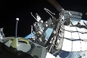 Fish-eye lens view of a portion of the International Space Station