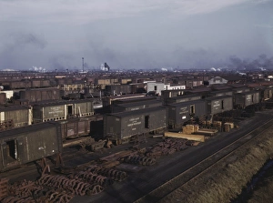 Freight cars being maneuvered in a Chicago and Northwestern railroad yard Freight cars being maneuvered in a Chicago and Northwestern railroad yard