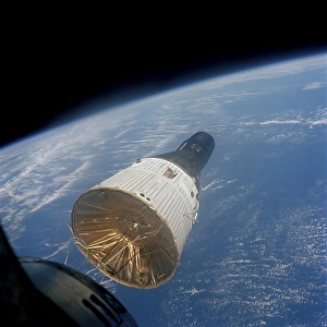 The Gemini-Titan 7 spacecraft in Earth orbit The Gemini-Titan 7 spacecraft in Earth orbit