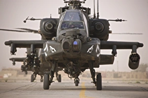 A group of AH-64D Apache helicopters on the runway at COB Speicher A group of AH-64D Apache helicopters on the runway at COB Speicher