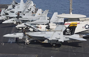 A group of F/A-18F Super Hornets on the flight deck of USS Dwight D. Eisenhower A group of F/A-18F Super Hornets on the flight deck of USS Dwight D. Eisenhower