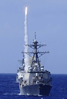 The guided-missile destroyer USS Benfold fires a surface-to-air missile off the coast The guided-missile destroyer USS Benfold fires a surface-to-air missile off the coast