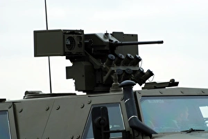 The gun mounted on top of the Dingo II armoured vehicle, used by the Belgian Army The gun mounted on top of the Dingo II armoured vehicle, used by the Belgian Army