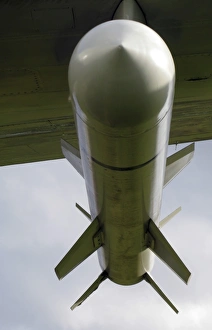 A harpoon missile attached to the wing of a P-3 Orion A harpoon missile attached to the wing of a P-3 Orion