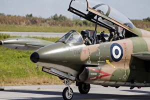 Hellenic Air Force pilots sitting inside a T-2E Buckeye Hellenic Air Force pilots sitting inside a T-2E Buckeye