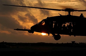 An HH-60G Pave Hawk helicopter prepares to land An HH-60G Pave Hawk helicopter prepares to land