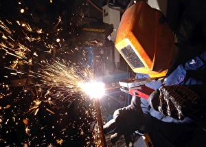 Hull Technician practices cutting metal using a Carbon arc Hull Technician practices cutting metal using a Carbon arc