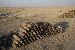 Inert artillery shells are stacked up for collection Inert artillery shells are stacked up for collection
