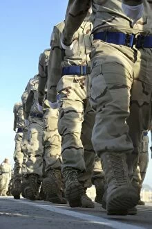 Images Dated 28th December 2009: Iraqi air force recruits march in a pass in review parade during their graduation