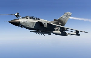 An Italian Air Force Tornado IDS conducts in-flight refueling An Italian Air Force Tornado IDS conducts in-flight refueling