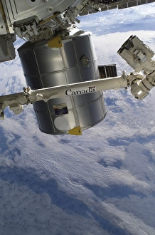 The Italian-built Raffaello Multi-Purpose Logistics Module and the Canadarm2 The Italian-built Raffaello Multi-Purpose Logistics Module and the Canadarm2