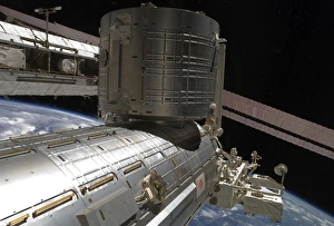<b class=qtipBold><figcaption>The Japanese Kibo complex</figcaption></b><br>February 11, 2010 - The Japanese Kibo complex backdropped by the blackness of space and part of Earth.<br><em>© Stocktrek Images</em> The Japanese Kibo complex