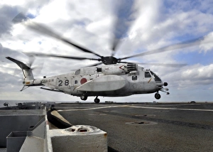 A Japanese Maritime Self-Defense Force MH-53 Sea Stallion lands on the flight deck A Japanese Maritime Self-Defense Force MH-53 Sea Stallion lands on the flight deck