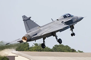 A JAS-39 Gripen of the Swedish Air Force taking off A JAS-39 Gripen of the Swedish Air Force taking off