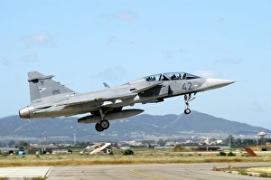 JAS-39D Gripen of the Hungarian Air Force landing at Decimomannu Air Base JAS-39D Gripen of the Hungarian Air Force landing at Decimomannu Air Base