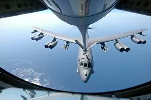 A KC-135 Stratotanker refuels a B-52 Stratofortress over the Indian Ocean