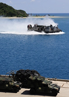 A landing craft air cushion approaches the well deck of USS Denver A landing craft air cushion approaches the well deck of USS Denver