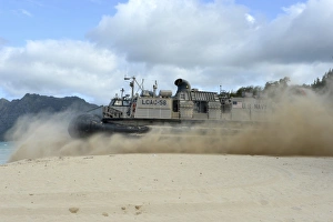 A landing craft air cushion departs for an equipment offload A landing craft air cushion departs for an equipment offload