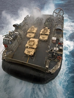 A Landing Craft Air Cushion exits the well deck of USS Bonhomme Richard A Landing Craft Air Cushion exits the well deck of USS Bonhomme Richard