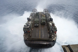 A landing craft air cushion leaves the well deck of USS Kearsarge A landing craft air cushion leaves the well deck of USS Kearsarge