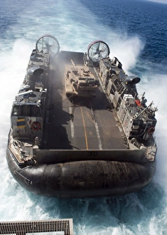 A landing craft air cushion transits the Pacific Ocean at high speed A landing craft air cushion transits the Pacific Ocean at high speed