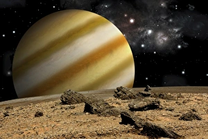 A large cloud covered planet rises over a rocky and barren alien world A large cloud covered planet rises over a rocky and barren alien world