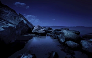Large rocks in a sea at night, Burgas region, Bulgaria Large rocks in a sea at night, Burgas region, Bulgaria