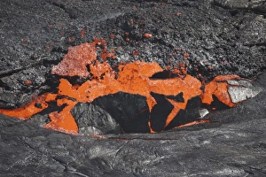 Lava breaking through crust of lava lake, Erta Ale volcano, Danakil Depression, Ethiopia Lava breaking through crust of lava lake, Erta Ale volcano, Danakil Depression, Ethiopia