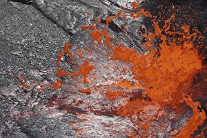 Lava bubble bursting through crust of active lava lake, Erta Ale volcano Lava bubble bursting through crust of active lava lake, Erta Ale volcano