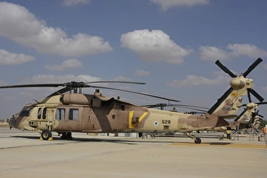 A line of UH-60L Yanshuf helicopters at Hatzerim Air Force Base A line of UH-60L Yanshuf helicopters at Hatzerim Air Force Base