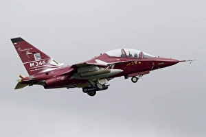 An M-346T Master trainer aircraft in flight over Italy An M-346T Master trainer aircraft in flight over Italy