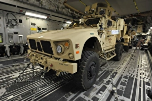 Two M-ATVs await transport on a C-17 Globemaster III Two M-ATVs await transport on a C-17 Globemaster III