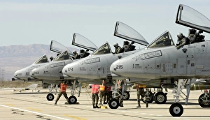 Maintainers perform pre-flight inspections on A-10 Thunderbolt II's Maintainers perform pre-flight inspections on A-10 Thunderbolt II's