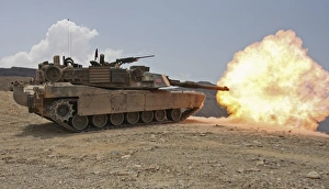 Marines bombard through a live fire range using M1A1 Abrams tanks Marines bombard through a live fire range using M1A1 Abrams tanks