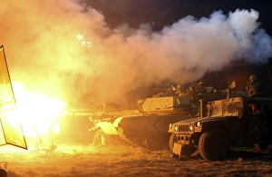 Marines fight aliens with a torrent of heavy tank and machine gunfire Marines fight aliens with a torrent of heavy tank and machine gunfire