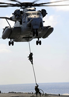 Marines rappel from a CH-53E Sea Stallion helicopter Marines rappel from a CH-53E Sea Stallion helicopter