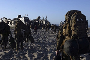Marines and Sailors load onto a Landing Craft Air-Cushion hovercraft Marines and Sailors load onto a Landing Craft Air-Cushion hovercraft