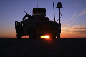 Marines take up a security position in a humvee Marines take up a security position in a humvee