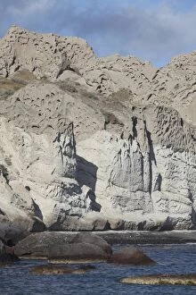 Massive weathered tuff deposits along the south coast of Santorini, Greece