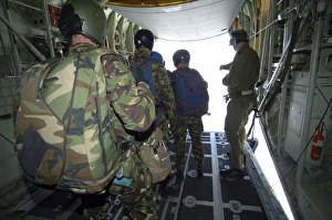 Members of the Pathfinder Platoon wait for parachute jump training aboard a C-130 Members of the Pathfinder Platoon wait for parachute jump training aboard a C-130