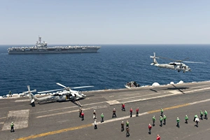 An MH-60R Sea Hawk helicopter launches from USS Harry S. Truman An MH-60R Sea Hawk helicopter launches from USS Harry S. Truman