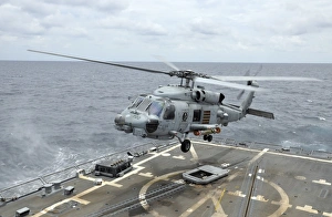 An MH-60R Sea Hawk helicopter lifts off from USS Wayne E. Meyer An MH-60R Sea Hawk helicopter lifts off from USS Wayne E. Meyer