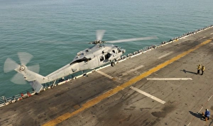 An MH-60S Sea Hawk lands on the flight deck of USS Bonhomme Richard An MH-60S Sea Hawk lands on the flight deck of USS Bonhomme Richard
