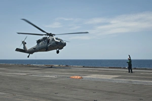 An MH-60S Sea Hawk prepares to land on the flight deck of USS Nimitz An MH-60S Sea Hawk prepares to land on the flight deck of USS Nimitz