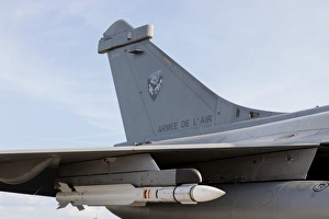 A MICA missile under the wing of a French Air Force Rafale aircraft A MICA missile under the wing of a French Air Force Rafale aircraft