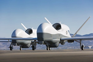 Two MQ-4C Triton unmanned aerial vehicles on the tarmac Two MQ-4C Triton unmanned aerial vehicles on the tarmac